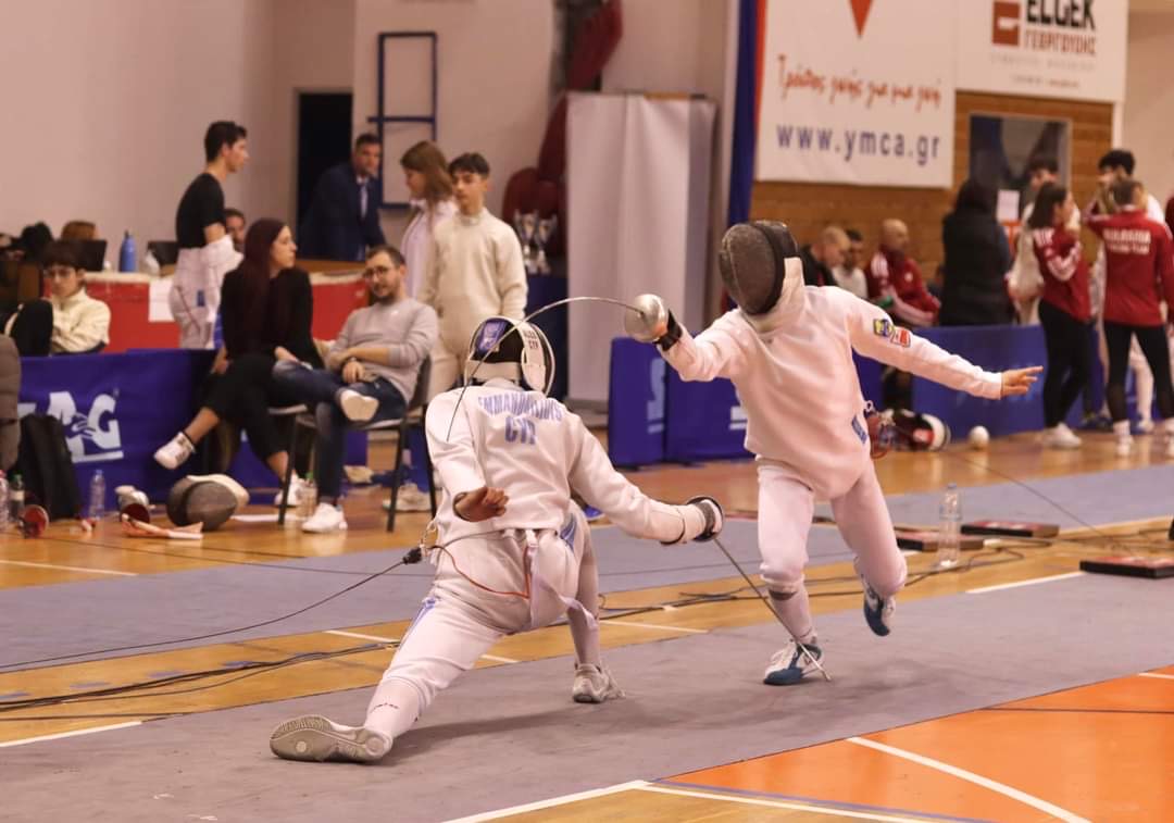 Alexandros competing in épée